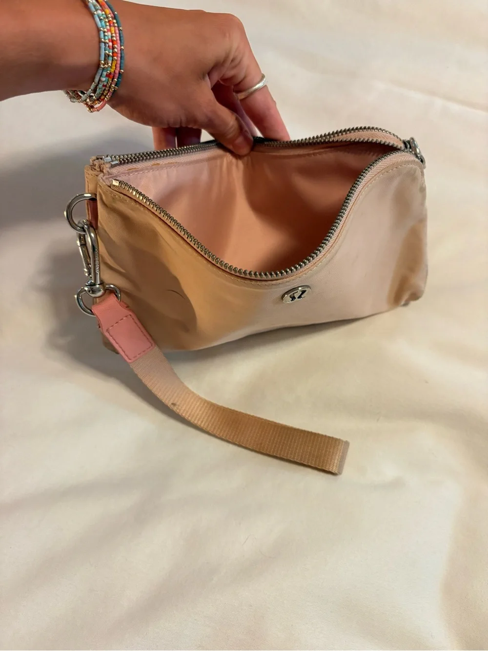 lululemon athletica Tan Wristlet Clutch with Pink Tab